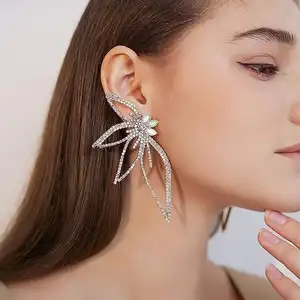 Mode femmes Sexy ailes argent aiguille boucles d'oreilles nouveau Hyperbole strass brillant grandes boucles d'oreilles pour fête bijoux oreille goujons