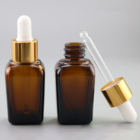Flacon carré ambré vide de 30 ml (1 oz) pour emballage cosmétique, huile essentielle, teinture pour les yeux, sérum pour le visage avec compte-gouttes doré