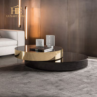 Table basse moderne de luxe convertible en acier inoxydable pour salon et table centrale ronde élégante