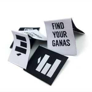 Etichette di abbigliamento in taffetà più popolari con etichetta di <span class=keywords><strong>Jeans</strong></span> a forma di rotolo antirughe con taglio Laser personalizzato in cotone - Product Image 1