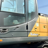 Excavatrice sur pneus Hyundai 210-9 d'occasion, modèle 21 tonnes, moteur Cummins 124KW, capacité de la benne 0,51-1,34m, boîte de vitesses, vente Shanghai