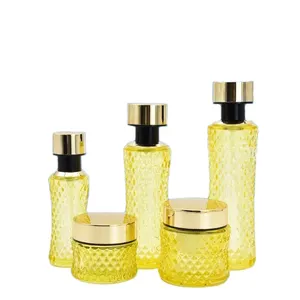 Luxury Clear Yellow Grid Fluted Body Glass Essence Bottle 120ml Customize Cosmetic Glass Packaging Cream Mask Jar for Skincare