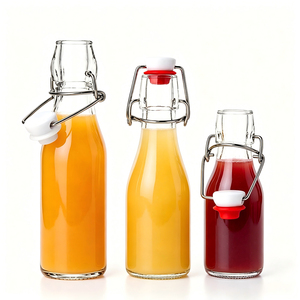 Botella de Vidrio Transparente Vacía con Tapón Metálico, Recipiente Reutilizable y Duradero para Jugo de Frutas, Aceite y Bebidas Caseras - Product Image 1