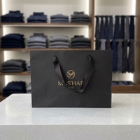 Quantité minimum de commande : 100 pièces |   Conception Gratuite |   Sac de shopping en papier pour bijoux de luxe blanc/noir, carton artistique 250 g/m², logo personnalisé avec poignée