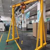 Grue à portique mobile électrique/manuelle sans rail de 0,5T/1T/1,5T/2T avec roues pour le levage avec palan électrique, petite grue d'intérieur