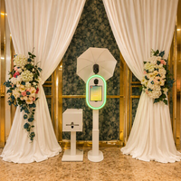 Machine Photobooth iPad surélevée avec colonne télescopique réglable et anneau lumineux LED pour événements, fêtes et photographie en studio