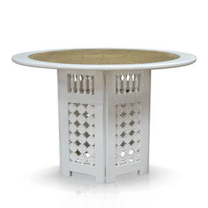 Moroccan Splendor 120cm <b>Dining</b> <b>Table</b> showcases handcrafted solid mahogany, intricate <b>rattan</b> webbing, and a sleek glass top - Product Image 1