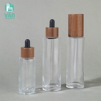 Ensemble de flacons cosmétiques en verre transparent de 50 ml et 100 ml avec compte-gouttes/pompe, bouchon en noyer noir, pour huile pour le visage, sérum, lotion, YAN Packaging Premium