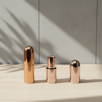 Tube de rouge à lèvres vide cylindrique métallique de luxe or rose avec capuchon dôme rechargeable, emballage cosmétique personnalisable