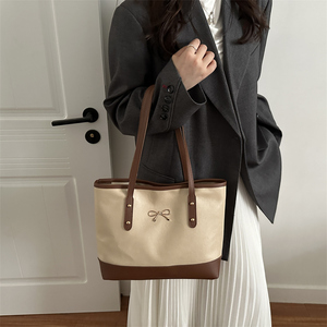 Sac fourre-tout de luxe <span class=keywords><strong>bicolore</strong></span> pour femme, sac à bandoulière élégant avec nœud, sac à main haut de gamme pour le bureau et les affaires 2026 - Product Image 1