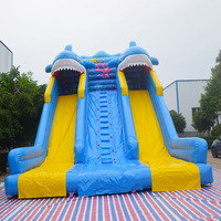 Château gonflable commercial géant à thème de dessin animé avec toboggan pour enfants, structure de saut gonflable