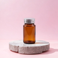 Bouteille de capsule en verre brun de 150ml pour produits de soins de santé Bouteille vide de forme plate étanche à la lumière avec bouchon à vis