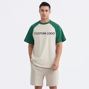 Kualitas tinggi kustom cetak layar grafis Raglan 100% katun kelas berat kebesaran streetwear ringer warna blok untuk pria t shirt