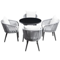 Ensemble de table et chaises de jardin en aluminium et corde, luxueux, durable et confortable, pour hôtel, cour et terrasse.