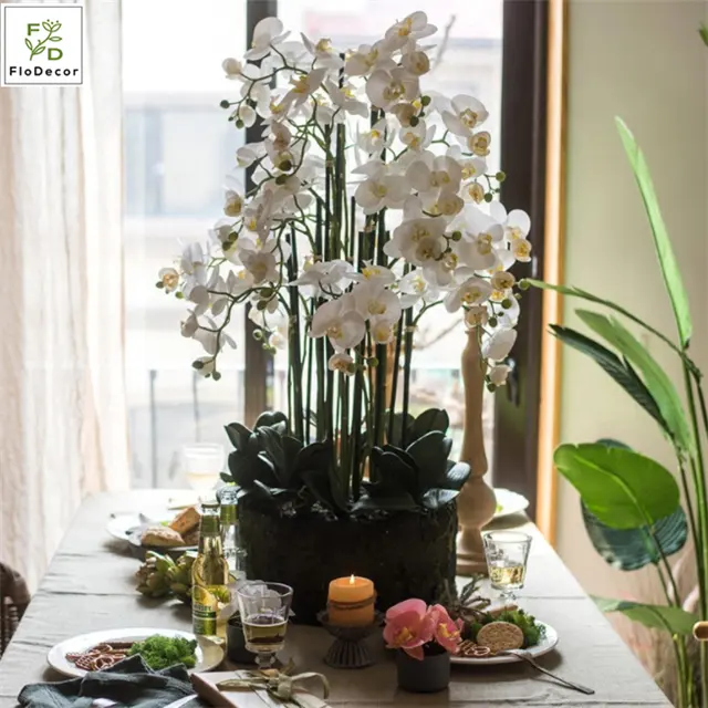 家の結婚披露宴のテーブルの装飾の設計のための地球の葉が付いている良質の贅沢な人工蘭の鉢植えの植物
