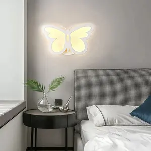 Las luces LED de pared de interior con diseño de mariposa, más vendidas, se instalan en las paredes de hoteles, librerías, cafeterías, oficinas y bares