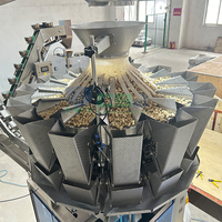 Peseuse combinée entièrement automatique à 14 têtes, thé, arachides, noix, remplissage de haricots au chocolat, machine d'emballage avec pondération
