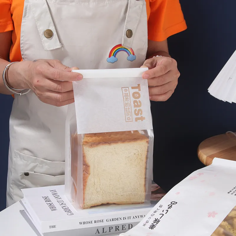 סיטונאי מפעל באיכות גבוהה מותאם אישית נייר כותנה מודפס גרפיטי שקיות אפייה עומדות שקיות לחם רב תכליתיות עם חלון