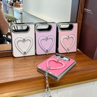 Coque de luxe électroplaquée pour iPhone Duo, étui de téléphone mignon avec support en forme de cœur creux et dragonne détachable en perles de cristal