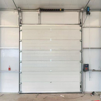 Porte sectionnelle industrielle victorienne robuste avec isolation thermique pour applications en cour