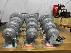 Rueda giratoria de caucho termoplástico gris de alta resistencia, con freno bloqueable, chapada en zinc, con protectores de rosca y placa de 5.5mm de espesor, amortiguadora. - Product Image 2