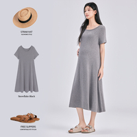 Robe d'allaitement CzzzyL pour femme, manches courtes, col élastique, taille froncée, mi-longue à volants, poches, couleur unie beige, silhouette élégante
