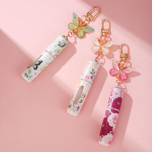 Mini Botella de Perfume de 5 ml con Llavero, Diseño Floral de Mariposa, Atomizador Recargable, Bomba, Accesorios de Viaje, Botella de Spray Vacía - Product Image 4