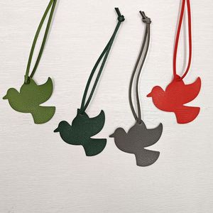 Hot-selling Peace Dove <b>Charm</b> Pendants Women's Luggage Tags PU Leather Keychain Pendant Accessories Hanging Ornaments - Product Image 2