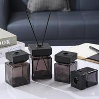 Bouteille d'eau de parfum remplie de logo personnalisé de 50ml 100ml 150ml 200ml 500ml Bouteilles en verre vides de diffuseur de parfum de roseau avec couvercle en bois