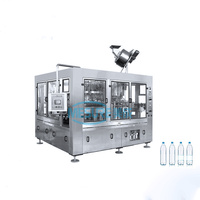 Machine monobloc de soufflage, de remplissage et de scellage pour bouteilles en plastique/PET |   Soufflage, rinçage, remplissage et bouchage intégrés