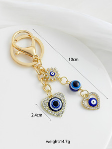 Nouveau porte-clés créatif en strass avec symbole porte-bonheur, œil protecteur, plaqué or, breloque cœur œil bleu pour la protection et la décoration de sac - Product Image 6