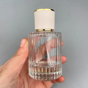 Botellas de perfume de vidrio de 30ml y 50ml, cilíndricas transparentes con tapa de rosca y boquilla para uso en viajes y muestras. - Product Image 3
