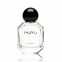Flacon de parfum HuiYu 50 ml (1,69 oz) haut de gamme avec logo personnalisé gravé, pulvérisateur à pompe, bouteille en verre transparente verte avec bouchon