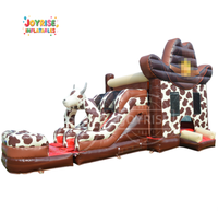 Structure gonflable à thème taureau avec toboggan pour enfants, idéale pour les fêtes en extérieur