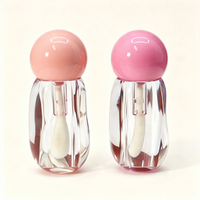 Tube de gloss transparent à effet d'ondulation irrégulière, avec bouchon sphérique, emballage vide pour gloss