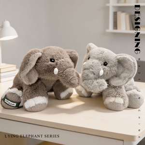 Morbido Peluche a Forma di Elefante Sdraiato - Cuscino Animale Imbottito Carino con Grandi Orecchie, Giocattolo Elefante Grigio Abbracciabile per Decorazione Camera dei Bambini - Product Image 1