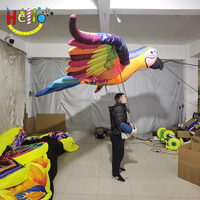 Costume de marche gonflable de défilé marionnette gonflable d'oiseau perroquet gonflable sauter aire de jeux de marionnettes d'oiseaux