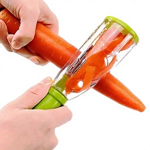 Éplucheur de légumes et trancheur de fruits avec récipient, lame en acier inoxydable pour éplucher manuellement <span class=keywords><strong>les</strong></span> légumes, <span class=keywords><strong>les</strong></span> pommes, <span class=keywords><strong>les</strong></span> carottes, <span class=keywords><strong>les</strong></span> pommes de terre - Product Image 1