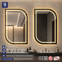 Miroir de salle de bain LED de luxe à cadre noir en forme d'arche, en métal mat, avec bande encastrée en forme de D, anti-buée, pour projets hôteliers, vente en gros personnalisée en vrac