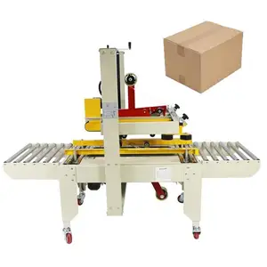 Automatic corrugated box taping strapping machines aseptic box packing machine box strapping packing machine