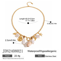 Collier en acier inoxydable plaqué or PVD 18 carats avec cœur en céramique corail étoile de mer conque escargot de mer poisson perle coquille océan