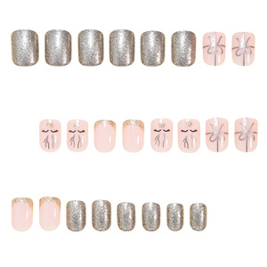 Uñas postizas de Navidad con diseño de lazo de regalo, cuernos y purpurina fina, puntas francesas lindas y sencillas, para fiestas navideñas, salón o DIY - Product Image 2