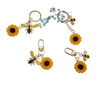 Porte-clés décapsuleur en alliage de zinc motif tournesol et abeille, inspirant, pour sacs féminins, cadeau pour petites entreprises, vente en gros, produit phare