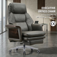 Chaise de bureau ergonomique de haute qualité en cuir véritable inclinable avec repose-pieds