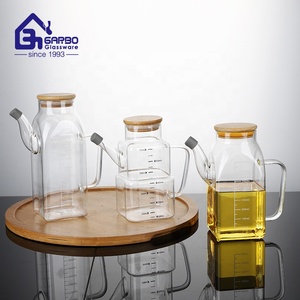 Nuevo diseño <span class=keywords><strong>de</strong></span> botella <span class=keywords><strong>de</strong></span> aceite diferente para almacenamiento <span class=keywords><strong>de</strong></span> <span class=keywords><strong>cocina</strong></span> borosilicato proveedor Chino tarros <span class=keywords><strong>de</strong></span> aceite con madera para el mercado <span class=keywords><strong>de</strong></span> Turquía - Product Image 1