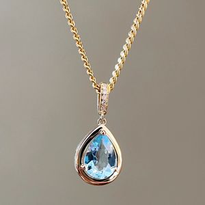 Pendentif pour femme Xinfly en or 18 carats avec pierre naturelle aigue-marine 0,55 carat en forme de goutte d'eau et diamant en forme de larme - Product Image 1
