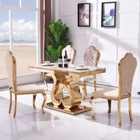 Ensemble de table à manger de luxe en acier inoxydable avec dessus en marbre pour appartement cuisine restaurant et salon