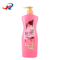 Bouteille pompe en plastique PE rose 400g avec logo personnalisé, forme incurvée pour emballage de liquides capillaires et de soins de la peau grande capacité