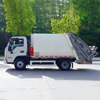 Camion de compression des déchets JAC 6CBM à alimentation automatique, camion de manutention de conteneurs à déchets, camion de ramassage des ordures ménagères pour l'assainissement communautaire