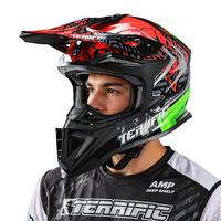 Casque de motocross rouge et noir intégral pour moto tout-terrain avec design graphique